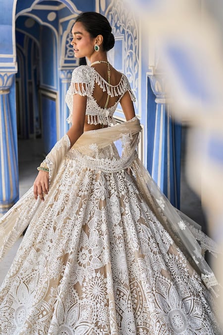 Buy_Seema Gujral_Ivory Net Pearls, Sequins, Embroidery Floral Bloom Bridal Lehenga Set _Online_at_Aza_Fashions