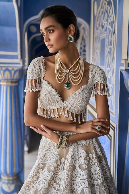 Seema Gujral_Ivory Net Pearls, Sequins, Embroidery Floral Bloom Bridal Lehenga Set _at_Aza_Fashions