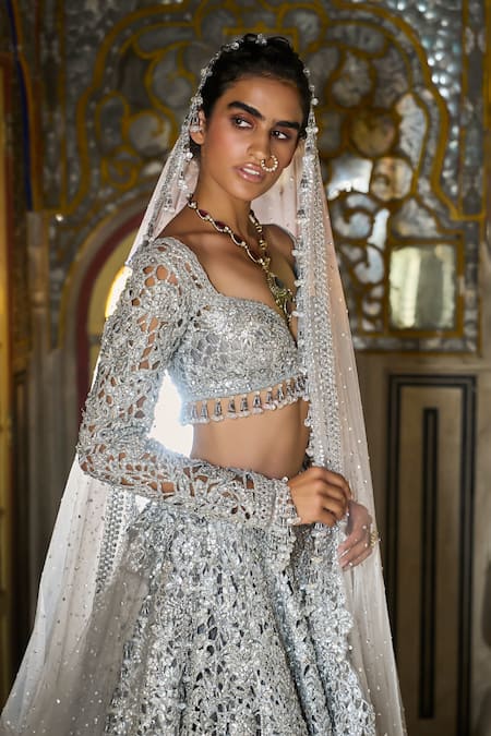 Seema Gujral_Silver Net Sequins, Crystals, Tassels, Floral Cutwork Bridal Lehenga Set _at_Aza_Fashions