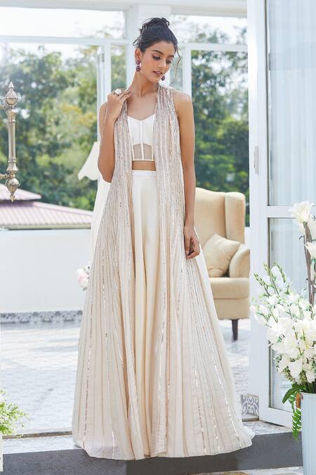 Shop Masumi Mewawalla X AZA Beige Tissue, Tulle, Maheshwari Lehenga Set With Embroidered Long Jacket Online at Aza Fashions Shop_Masumi Mewawalla X AZA_Beige Tissue, Tulle, Maheshwari Lehenga Set With Embroidered Long Jacket _Online_at_Aza_Fashions