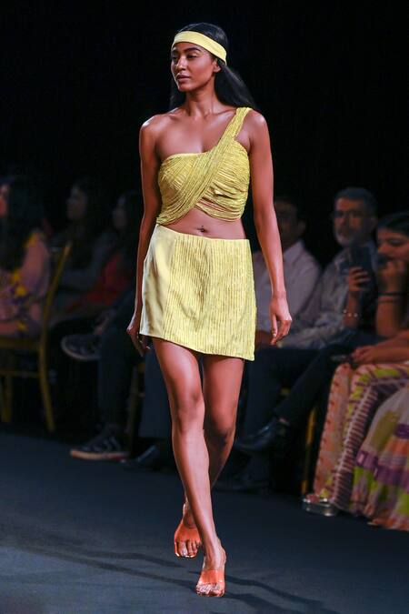 Nirmooha Yellow Lurex, Microfiber Beads One Embellished Overlap Skirt With Crop Top Online at Aza Fashions Nirmooha_Yellow Lurex, Microfiber Beads One Embellished Overlap Skirt With Crop Top _Online_at_Aza_Fashions