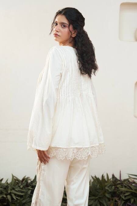 Shop Ourdve Beige Cotton Cut Work Round Neck Floral Hem Top And Pant Set at Aza Fashions Shop_Ourdve_Beige Cotton Cut Work Round Neck Floral Hem Top And Pant Set _at_Aza_Fashions