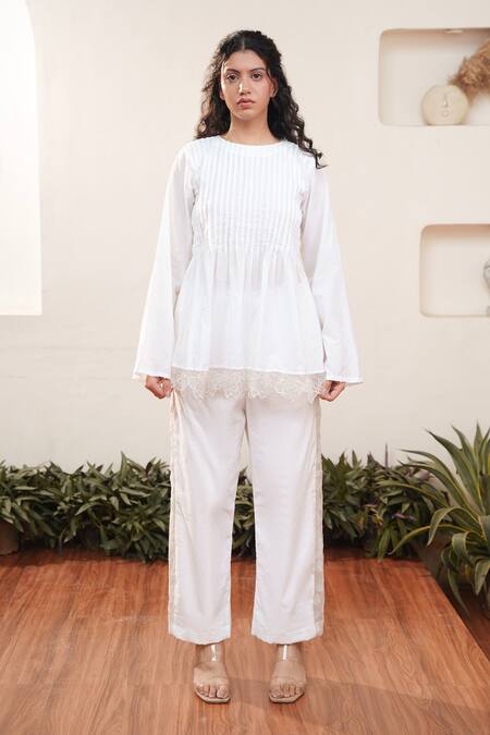 Ourdve Beige Cotton Cut Work Round Neck Floral Hem Top And Pant Set at Aza Fashions Ourdve_Beige Cotton Cut Work Round Neck Floral Hem Top And Pant Set _at_Aza_Fashions