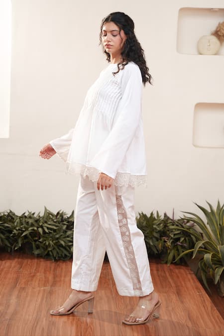 Shop OurDve White Cotton Cut Work, Embroidery Round Neck Pleated Top And Pant Set Online at Aza Fashions Shop_OurDve_White Cotton Cut Work, Embroidery Round Neck Pleated Top And Pant Set _Online_at_Aza_Fashions