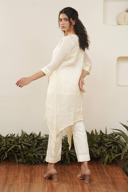 Shop OurDve Beige Cotton Embroidery Round Neck Asymmetric Stripe Pattern Tunic And Pant Set at Aza Fashions Shop_OurDve_Beige Cotton Embroidery Round Neck Asymmetric Stripe Pattern Tunic And Pant Set _at_Aza_Fashions