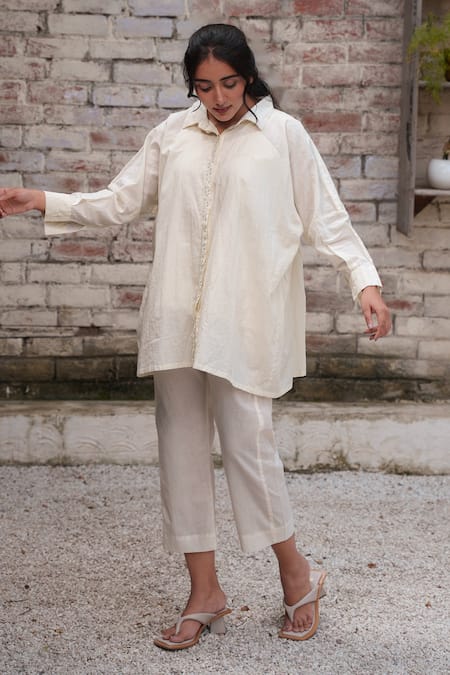 Shop Ourdve Beige Cotton Embroidery Collared Floral Placket Top at Aza Fashions Shop_Ourdve_Beige Cotton Embroidery Collared Floral Placket Top _at_Aza_Fashions