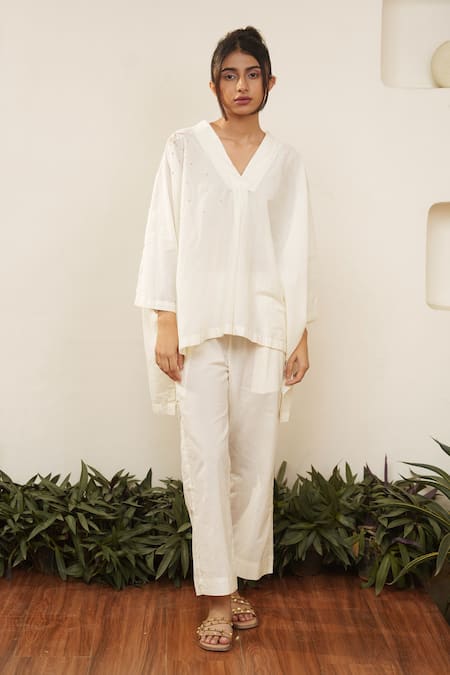 Shop_Ourdve_Beige Cotton Embroidered Thread V Neck High Low Top _at_Aza_Fashions