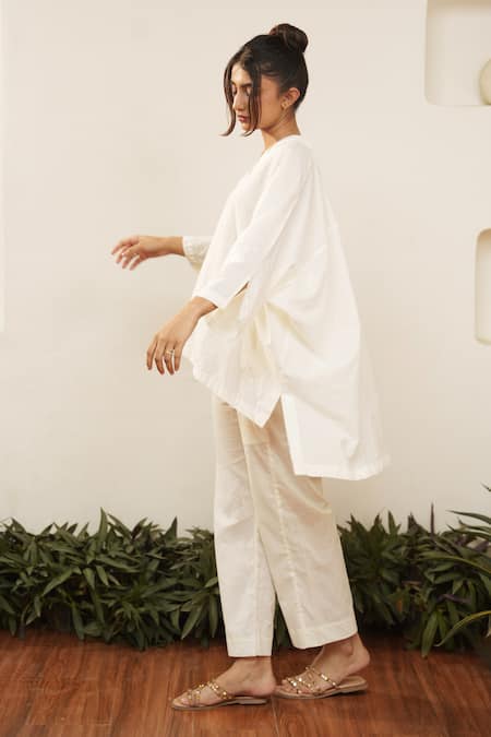 Buy_Ourdve_Beige Cotton Embroidered Thread V Neck High Low Top _Online_at_Aza_Fashions