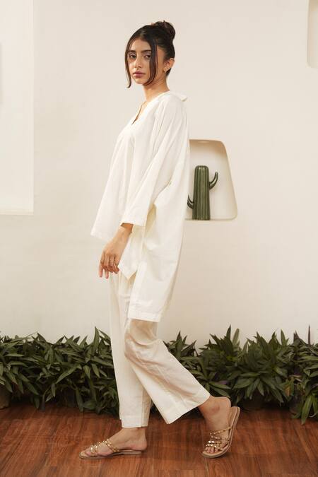 Shop_Ourdve_Beige Cotton Embroidered Thread V Neck High Low Top _Online_at_Aza_Fashions