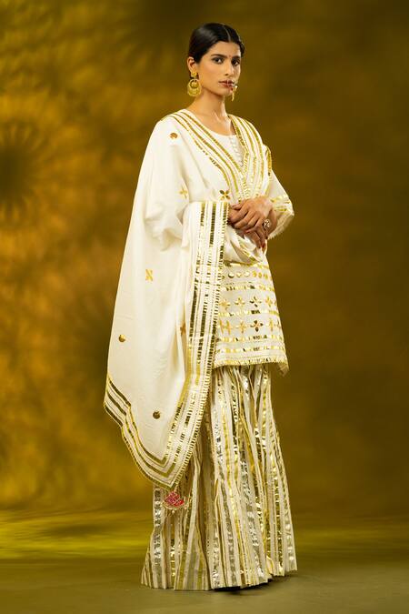 Buy_Shivani Sabharwal_White Cotton Embroidery, Gota Patti Round Neck Gold Kurta Sharara Set _Online_at_Aza_Fashions