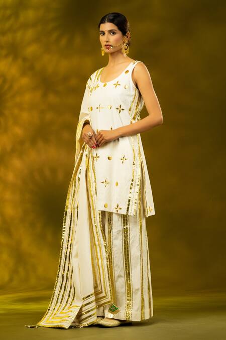 Buy_Shivani Sabharwal_White Cotton Gota Patti, Zari Round Neck Embroidered Kurta Flared Pant Set _Online_at_Aza_Fashions