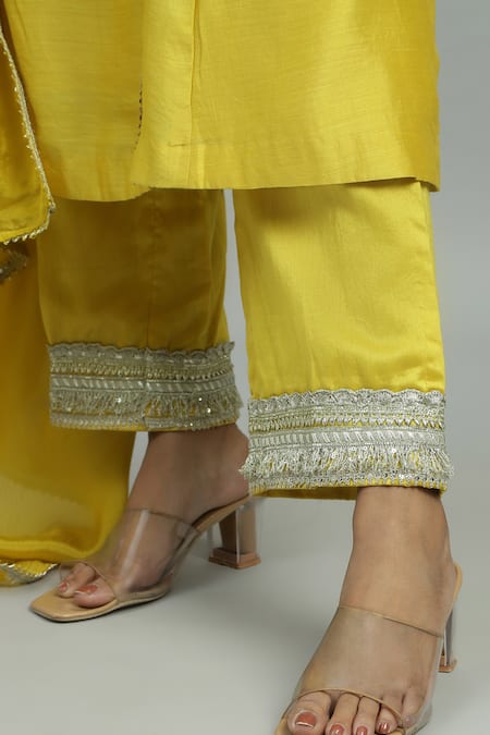 Shop Siyona By Ankurita Yellow Chanderi, Silk Lace, Sequins, Genda And Ghungroo Kurta & Pant Set Online at Aza Fashions Shop_Siyona By Ankurita_Yellow Chanderi, Silk Lace, Sequins, Genda And Ghungroo Kurta & Pant Set _Online_at_Aza_Fashions