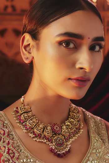 Buy Karisa Designs Gold Plated Nakash Goddess Laxmi Carved Pendant Choker at Aza Fashions Buy_Karisa Designs_Gold Plated Nakash Goddess Laxmi Carved Pendant Choker _at_Aza_Fashions