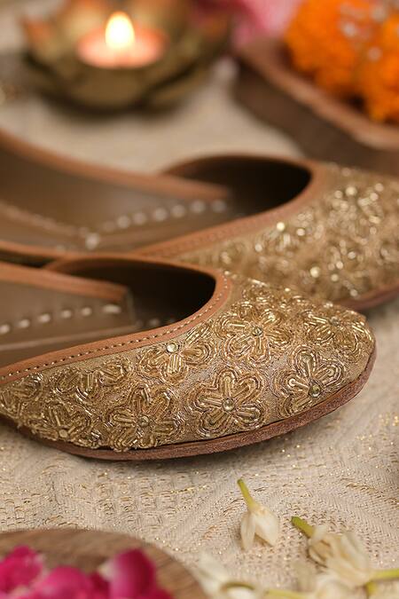 Coral Haze_Gold Crystals, Cut Work, Beads Shamaa Embellished Juttis _Online_at_Aza_Fashions