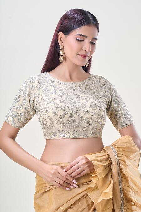 Samyukta Singhania Cream Net Sequins, Zari Round Neck Embroidered Saree Blouse at Aza Fashions Samyukta Singhania_Cream Net Sequins, Zari Round Neck Embroidered Saree Blouse_at_Aza_Fashions