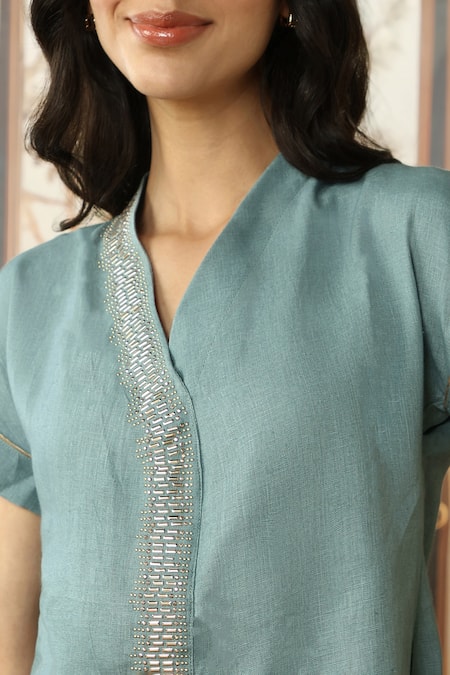 Kaveri_Blue Linen Studs V-neck Starlight Wave Embellished Top With Pant _at_Aza_Fashions
