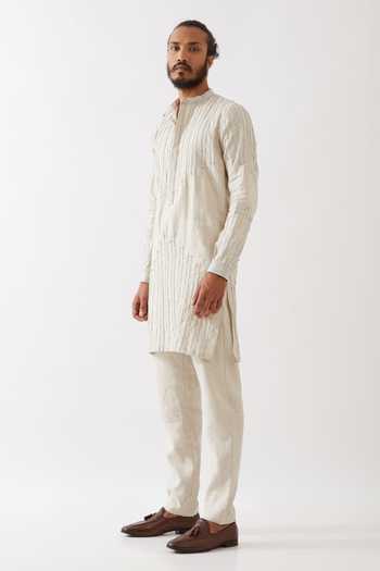 Buy Son Of A Noble Snob Ivory Linen Gabriel Pintuck And Stitchline Embroidered Kurta With Trouser Online at Aza Fashions Buy_Son Of A Noble Snob_Ivory Linen Gabriel Pintuck And Stitchline Embroidered Kurta With Trouser _Online_at_Aza_Fashions
