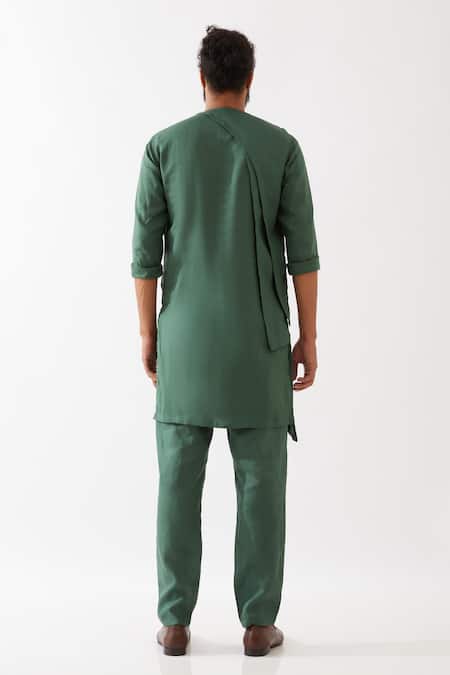 Shop Son Of A Noble Snob Green Linen Theo Asymmetric Kurta With Trousers at Aza Fashions Shop_Son Of A Noble Snob_Green Linen Theo Asymmetric Kurta With Trousers _at_Aza_Fashions