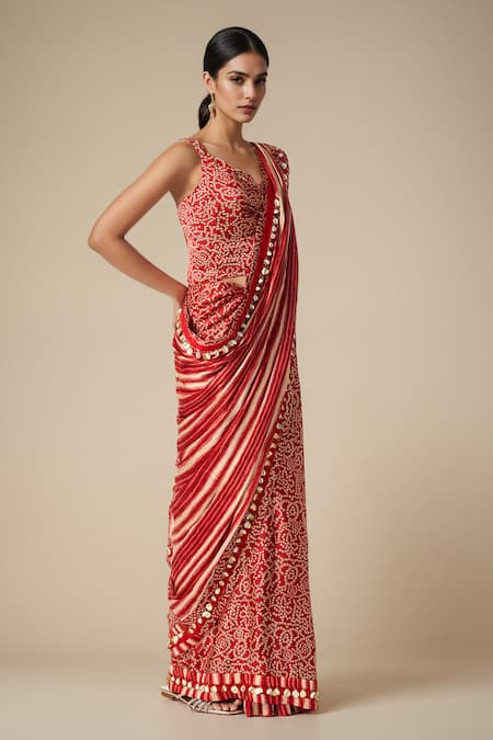 Shop Gulabo By Abu Sandeep Red Modal Satin Printed Bandhani Embellished Hem Saree Online at Aza Fashions Shop_Gulabo By Abu Sandeep_Red Modal Satin Printed Bandhani Embellished Hem Saree _Online_at_Aza_Fashions