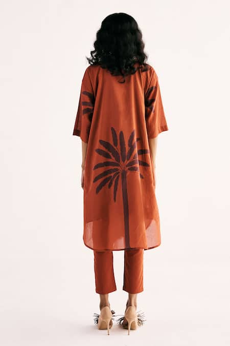 Shop Kharakapas Red Cotton Bandeau Neck Rustic Palm Print Straight Kurta With Pant at Aza Fashions Shop_Kharakapas_Red Cotton Bandeau Neck Rustic Palm Print Straight Kurta With Pant _at_Aza_Fashions