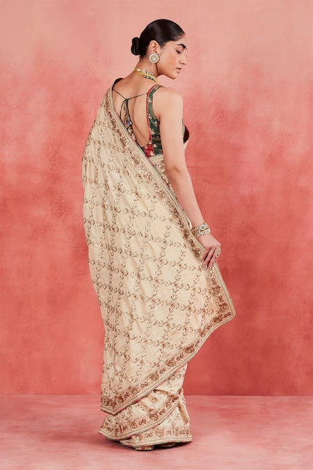 Shop Sue Mue Beige Silk Sequins, Tassels Round Neck Nurul Embroidered Saree With Blouse at Aza Fashions Shop_Sue Mue_Beige Silk Sequins, Tassels Round Neck Nurul Embroidered Saree With Blouse _at_Aza_Fashions