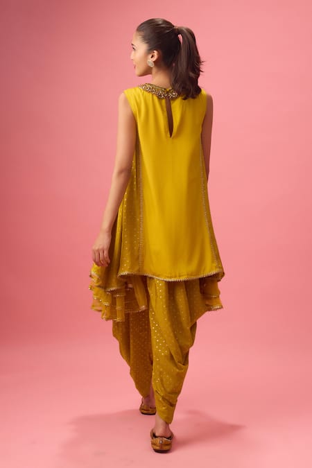 Shop Nikasha Yellow Silk, Net Cut Embroidered Neckline Asymmetric Kurta And Dhoti Pant Set at Aza Fashions Shop_Nikasha_Yellow Silk, Net Cut Embroidered Neckline Asymmetric Kurta And Dhoti Pant Set _at_Aza_Fashions