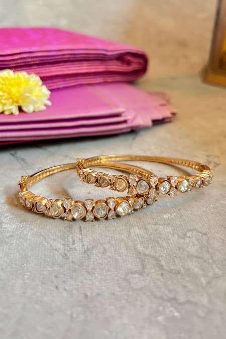 Shop Prestones Gold Plated Diamonds, Cut Work Moissanite Polki Embellished Bangle - Set Of 2 at Aza Fashions Shop_Prestones_Gold Plated Diamonds, Cut Work Moissanite Polki Embellished Bangle - Set Of 2_at_Aza_Fashions