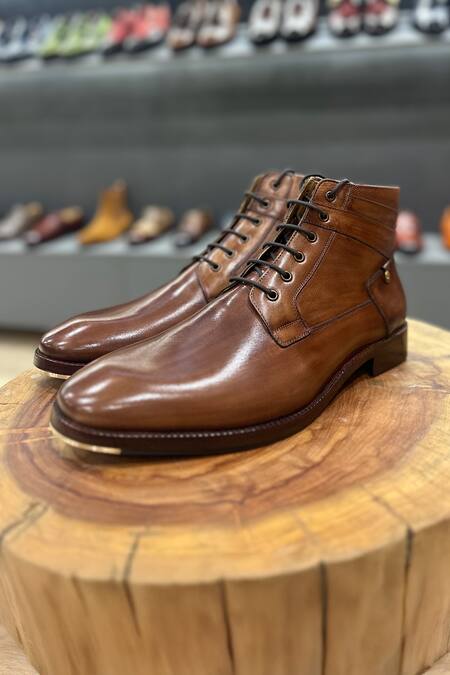 Buy Fellmonger Brown Mirror Glossed Patina Mid Boots Online at Aza Fashions Buy_Fellmonger_Brown Mirror Glossed Patina Mid Boots _Online_at_Aza_Fashions