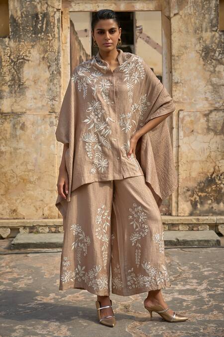 Buy Dash And Dot Beige Nylon, Rayon Embroidery Shawl Neck Thread Cape Top Online at Aza Fashions Buy_Dash And Dot_Beige Nylon, Rayon Embroidery Shawl Neck Thread Cape Top _Online_at_Aza_Fashions