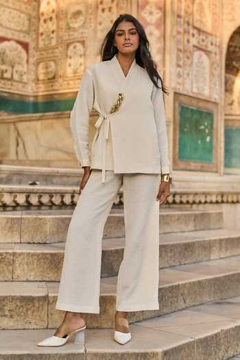 Dash And Dot_Ivory Polyester Chains Shawl Neck Textured Tie-up Top And Pant Set_at_Aza_Fashions
