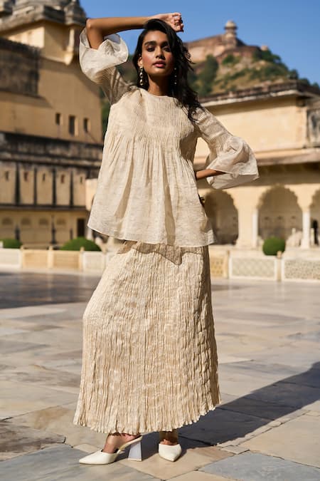 Buy Dash And Dot Ivory Silk, Cotton, Lurex Round Neck Stripe Patterned Peplum Top Online at Aza Fashions Buy_Dash And Dot_Ivory Silk, Cotton, Lurex Round Neck Stripe Patterned Peplum Top _Online_at_Aza_Fashions