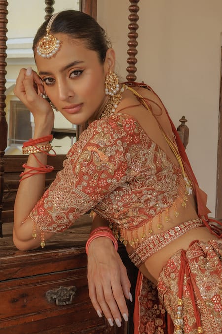 Shop MAISARA JEWELRY Red Stones Leaf Carved Cutwork Bangles - Set Of 2 at Aza Fashions Shop_MAISARA JEWELRY_Red Stones Leaf Carved Cutwork Bangles - Set Of 2 _at_Aza_Fashions