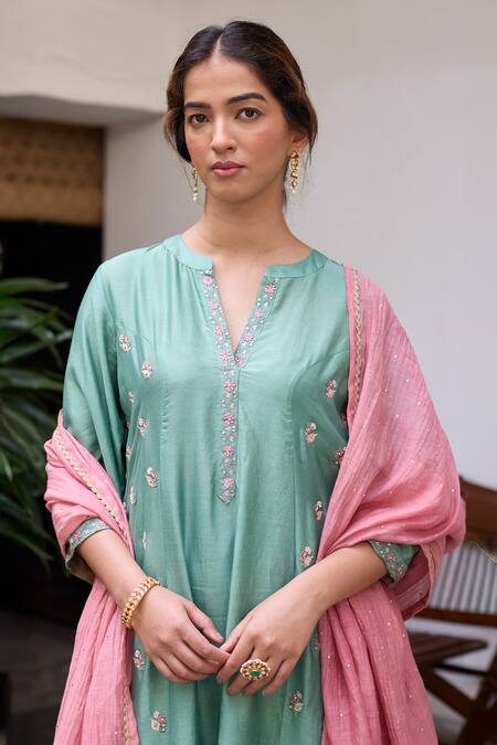 MAISARA JEWELRY Red Stones Leaf Carved Cutwork Bangles - Set Of 2 Online at Aza Fashions MAISARA JEWELRY_Red Stones Leaf Carved Cutwork Bangles - Set Of 2 _Online_at_Aza_Fashions