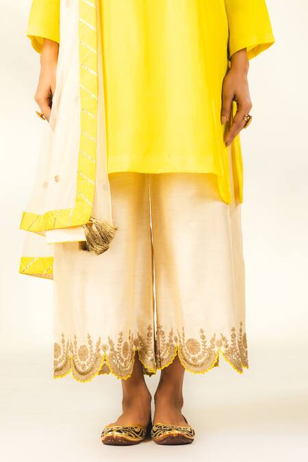 Shivani Sabharwal_Yellow Crepe, Silk, Net Sequins, Embroidery, Dori Short Kurta Flared Pant Set _Online_at_Aza_Fashions