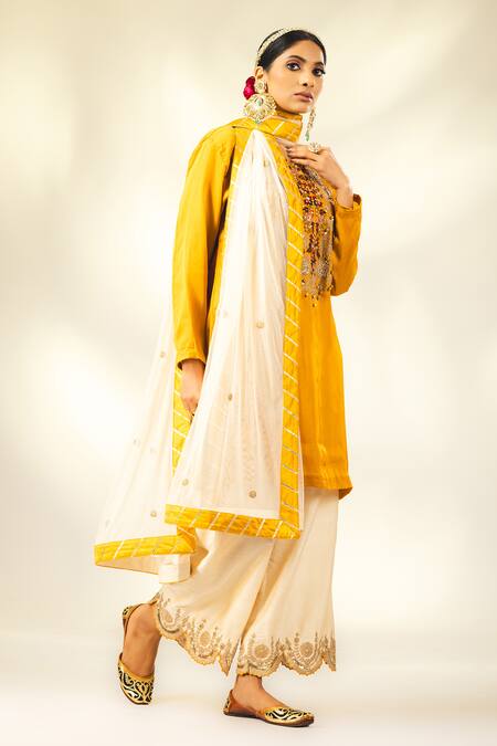 Buy Shivani Sabharwal Yellow Crepe, Silk, Net Dori Thread Embroidered Short Kurta Flared Pant Set Online at Aza Fashions Buy_Shivani Sabharwal_Yellow Crepe, Silk, Net Dori Thread Embroidered Short Kurta Flared Pant Set _Online_at_Aza_Fashions