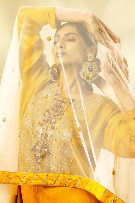 Shivani Sabharwal Yellow Crepe, Silk, Net Dori Thread Embroidered Short Kurta Flared Pant Set at Aza Fashions Shivani Sabharwal_Yellow Crepe, Silk, Net Dori Thread Embroidered Short Kurta Flared Pant Set _at_Aza_Fashions
