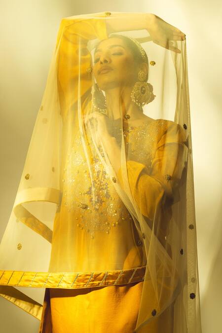 Buy Shivani Sabharwal Yellow Crepe, Silk, Net Dori Thread Embroidered Short Kurta Flared Pant Set Buy_Shivani Sabharwal_Yellow Crepe, Silk, Net Dori Thread Embroidered Short Kurta Flared Pant Set