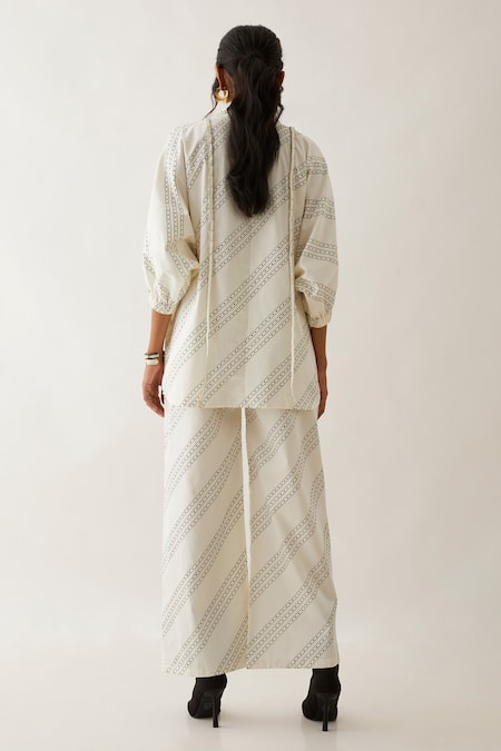 Shop Son Of A Noble Snob Off White Cotton Satin Printed Carnival Shirt Collar Dana With Trousers at Aza Fashions Shop_Son Of A Noble Snob_Off White Cotton Satin Printed Carnival Shirt Collar Dana With Trousers _at_Aza_Fashions