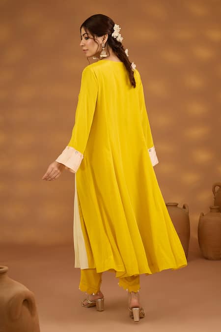 Shop ISHA GUPTA TAYAL Yellow Crepe, Net, Cotton Sequins, Patchwork, Embroidery Nandi Bagh Kurta Set at Aza Fashions Shop_ISHA GUPTA TAYAL_Yellow Crepe, Net, Cotton Sequins, Patchwork, Embroidery Nandi Bagh Kurta Set _at_Aza_Fashions