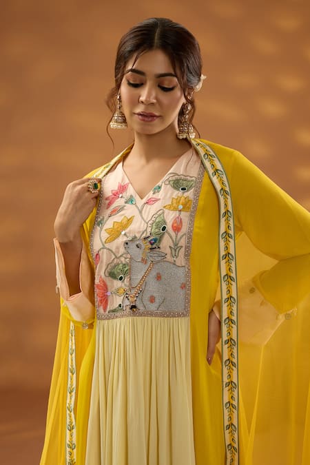 ISHA GUPTA TAYAL Yellow Crepe, Net, Cotton Sequins, Patchwork, Embroidery Nandi Bagh Kurta Set Online at Aza Fashions ISHA GUPTA TAYAL_Yellow Crepe, Net, Cotton Sequins, Patchwork, Embroidery Nandi Bagh Kurta Set _Online_at_Aza_Fashions