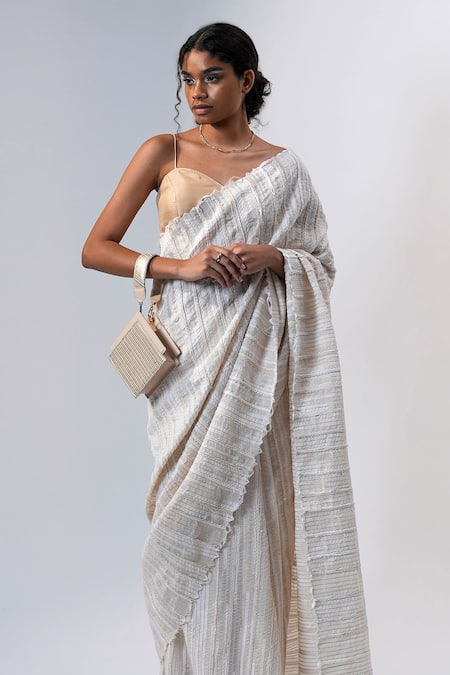 Adisee_Ivory Ajrakh Handwoven Textured Wrist Bag _Online_at_Aza_Fashions