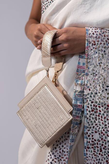 Buy_Adisee_Ivory Ajrakh Handwoven Textured Wrist Bag _Online_at_Aza_Fashions