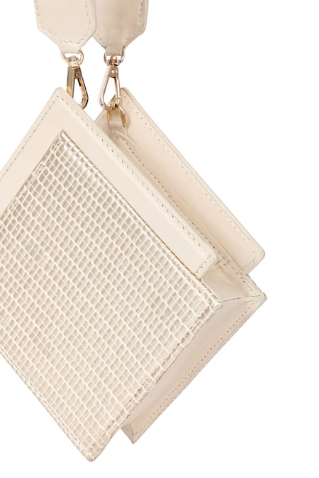 Adisee_Ivory Ajrakh Handwoven Textured Wrist Bag _at_Aza_Fashions