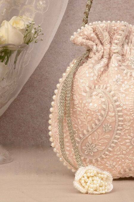 Shop Amyra Peach Embroidery, Sequins Rhea Potli Bag Online at Aza Fashions Shop_Amyra_Peach Embroidery, Sequins Rhea Potli Bag _Online_at_Aza_Fashions