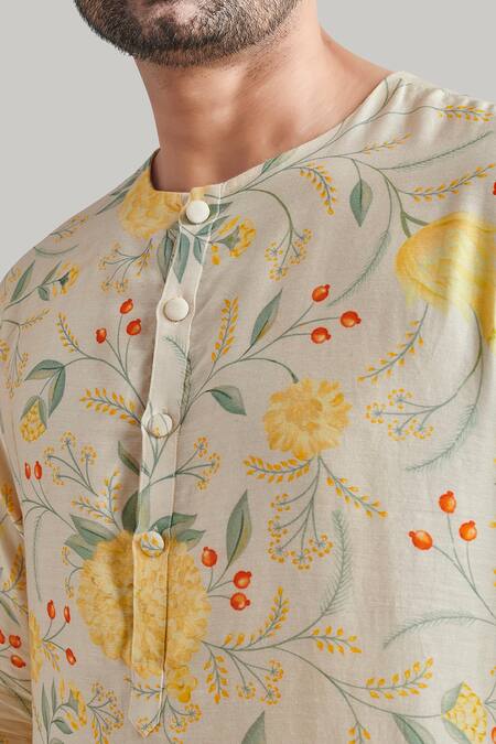 Shop Blue Lotus Design Ivory Cotton, Silk, Lycra Floral Print Kurta And Pant Set Online at Aza Fashions Shop_Blue Lotus Design_Ivory Cotton, Silk, Lycra Floral Print Kurta And Pant Set _Online_at_Aza_Fashions