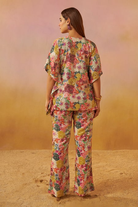 Shop Rainas Off White Georgette Sequins V-neck Blossom Print Kaftan And Flared Pant Set at Aza Fashions Shop_Rainas_Off White Georgette Sequins V-neck Blossom Print Kaftan And Flared Pant Set _at_Aza_Fashions
