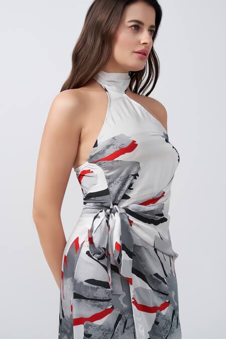 House Of Varada White Modal, Satin Halter Neck Floral Print Asymmetric Wrap Dress at Aza Fashions House Of Varada_White Modal, Satin Halter Neck Floral Print Asymmetric Wrap Dress _at_Aza_Fashions