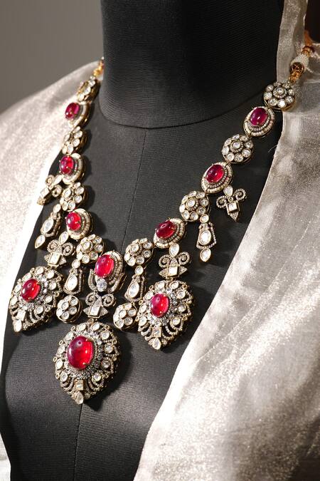 Shop_Amaara Jewels_Red Diamonds, Stones Tear Drop Carved Ruby Embellished Necklace Set_Online_at_Aza_Fashions