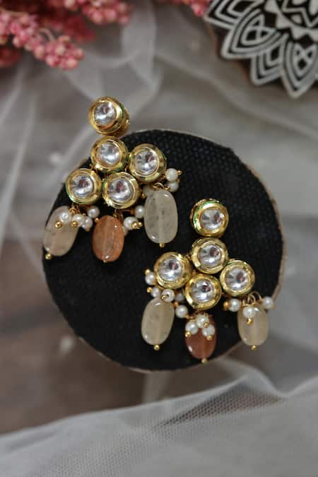 Shop Do Taara Gold Plated Pearls, Stones Clover Blossom Kundan Embellished Earrings at Aza Fashions Shop_Do Taara_Gold Plated Pearls, Stones Clover Blossom Kundan Embellished Earrings _at_Aza_Fashions