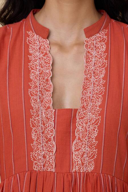 The Summer House Orange Cotton, Voile Embroidery Plunge Neck Sabah Thread Placket Dress at Aza Fashions The Summer House_Orange Cotton, Voile Embroidery Plunge Neck Sabah Thread Placket Dress_at_Aza_Fashions